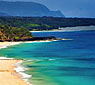 Blue waters break on Secrets Beack, Kauai
